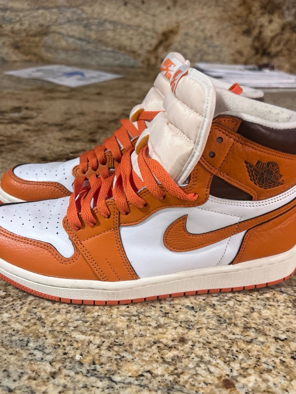 Jordan 1 Mid Men’s Sneakers in Orange and White